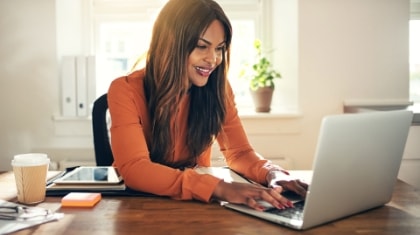 Person working on a laptop computer